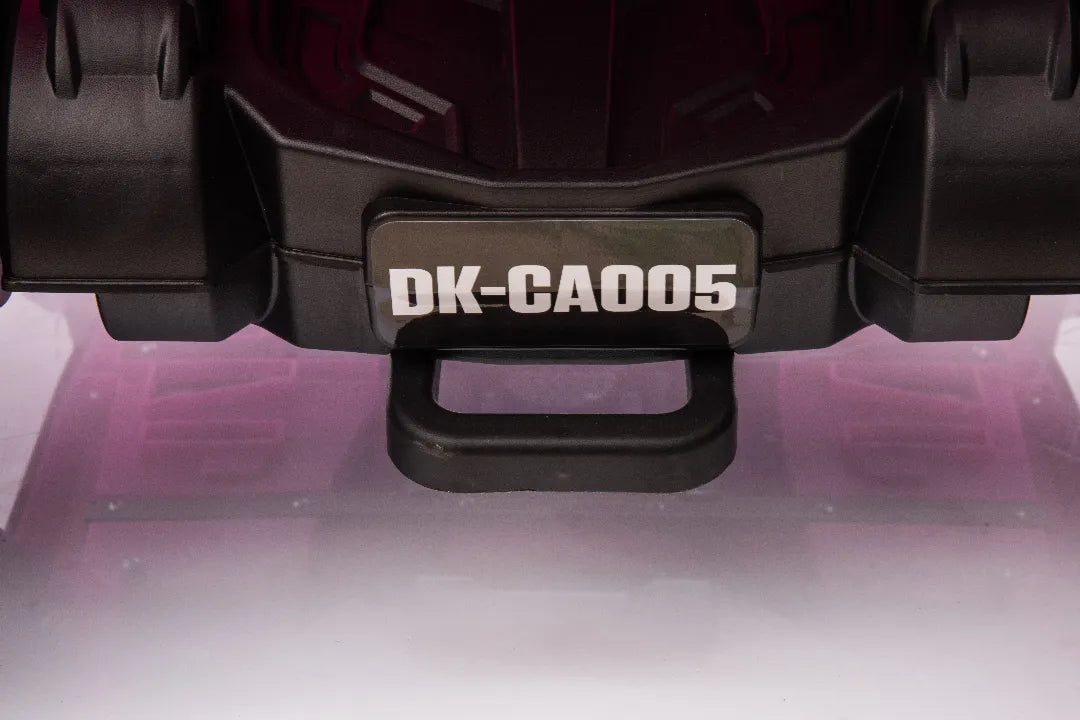 Close-up of black rear tow hook with model number DK-CA005 on pink 24V Can-Am Outlander Monster 2-seater ride-on quad