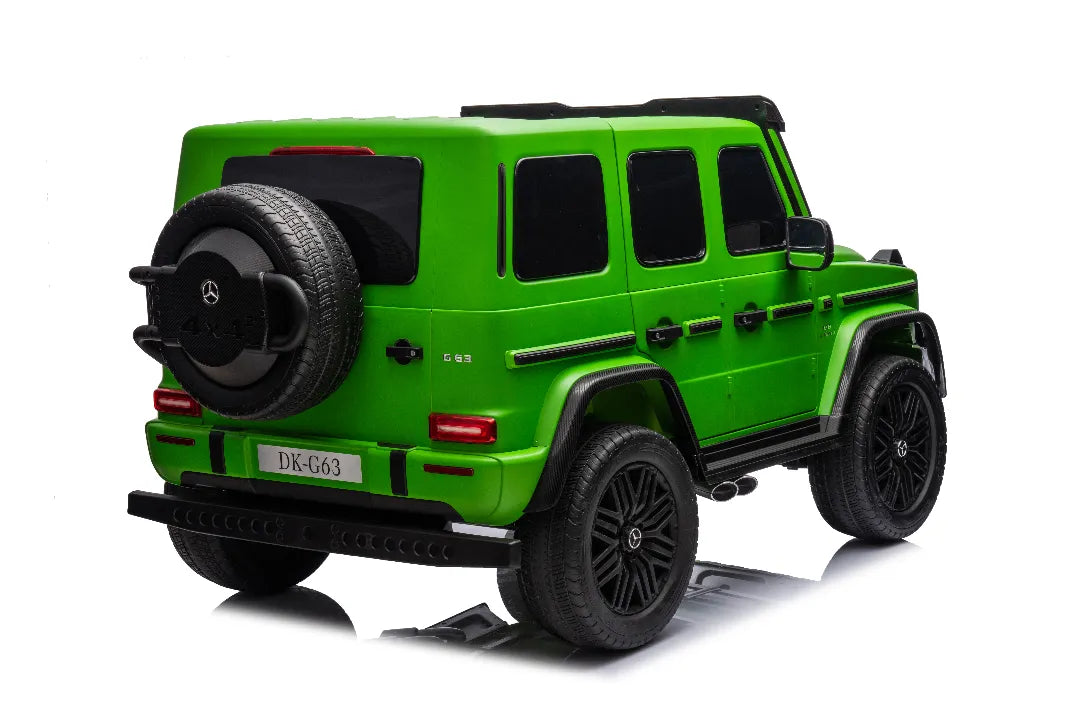 Rear view of green 24V 14Ah licensed Mercedes-AMG G63 kids ride-on car with 800W motor and black wheels