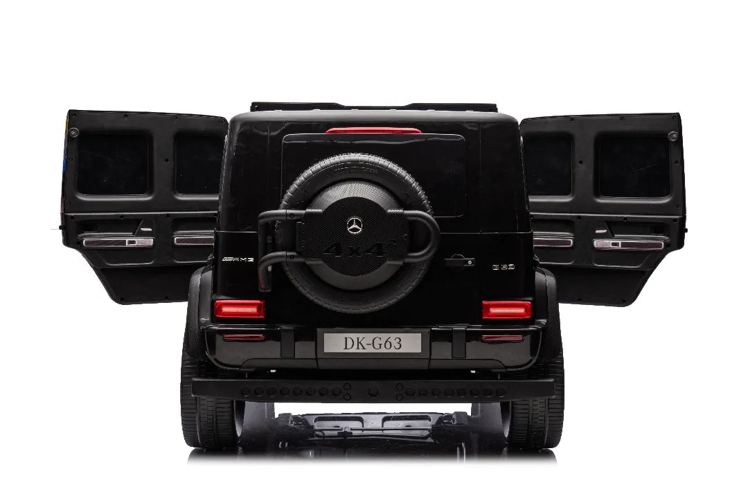 Rear view of black 24V 14Ah licensed Mercedes-AMG G63 kids ride-on car with open rear doors and spare tire detail