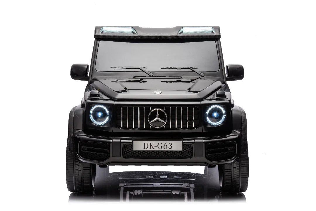 Front view of black 24V 14Ah licensed Mercedes-AMG G63 800W 4x4 kids ride-on car with LED headlights