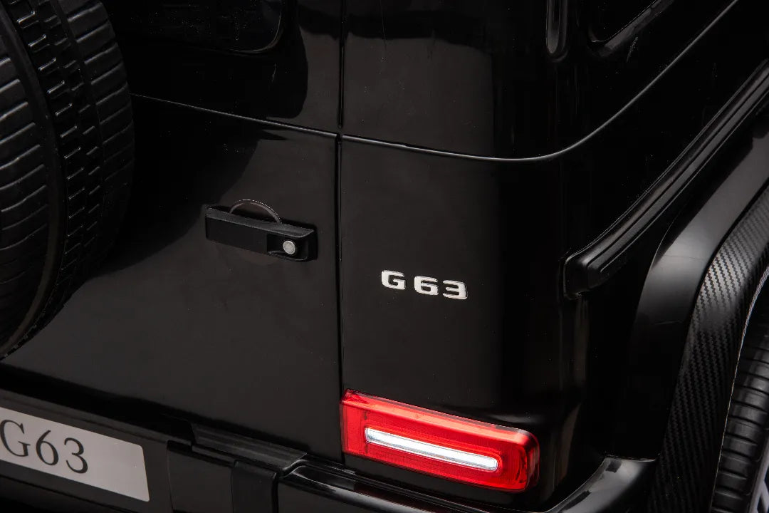 Close-up of rear side door and taillight on black 24V Licensed Mercedes-AMG G63 800W 4x4 kids ride-on car
