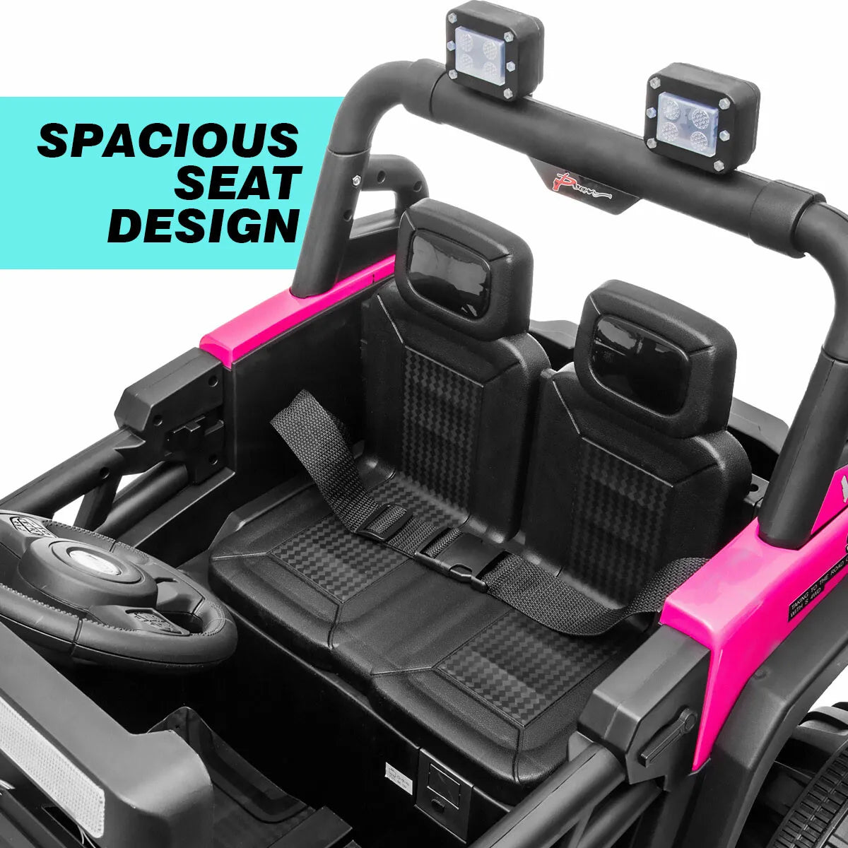 Close-up of pink 12V Jeep ride-on car interior showing spacious black seat design with safety belt and steering wheel