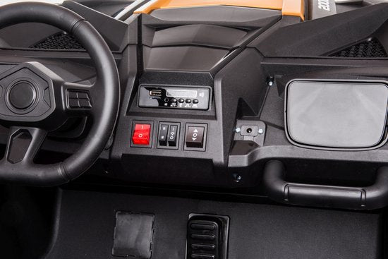 Dashboard and control panel of the Stinger Buggy XL 24V 4x4 kids ride-on car showing steering wheel and switches