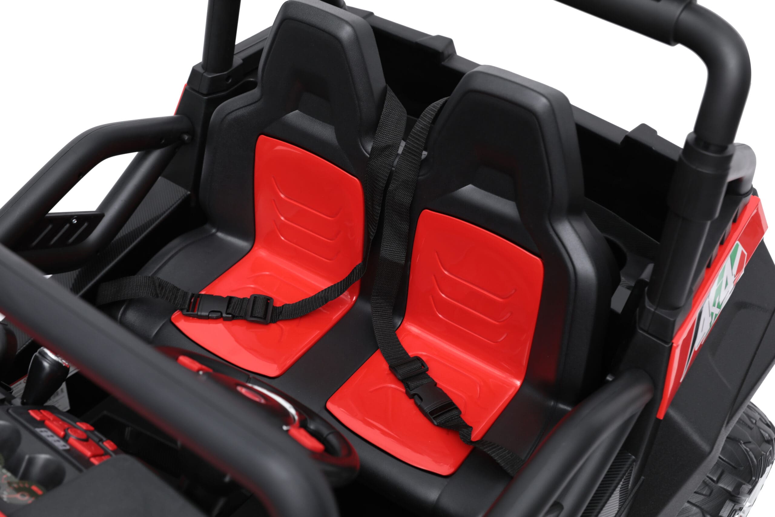 Close-up of red and black dual seats with seatbelts in a 24V electric kids ride-on beach buggy toy.
