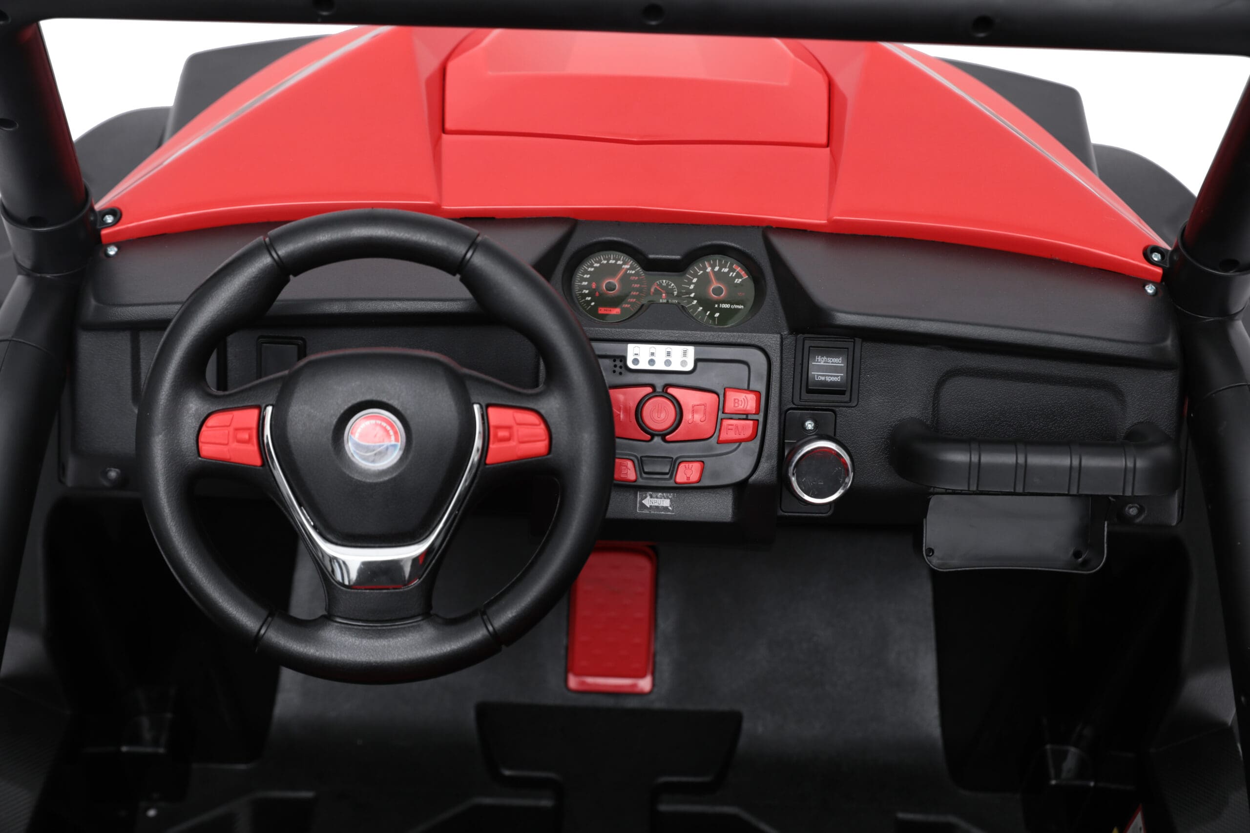 Close-up of the red 24V Speed Beach Buggy electric ride-on dashboard and steering wheel for kids