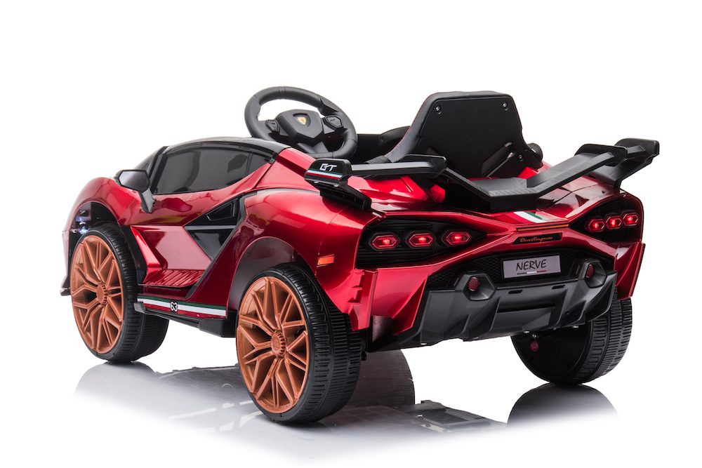 Red 12V Lamborghini-inspired ride-on race car for kids with black seat and orange wheels, designed for ages 3 and up.