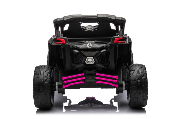 Rear view of a black and pink Can-Am Maverick 24V kids ride-on UTV with large EVA rubber tires and LED lights.