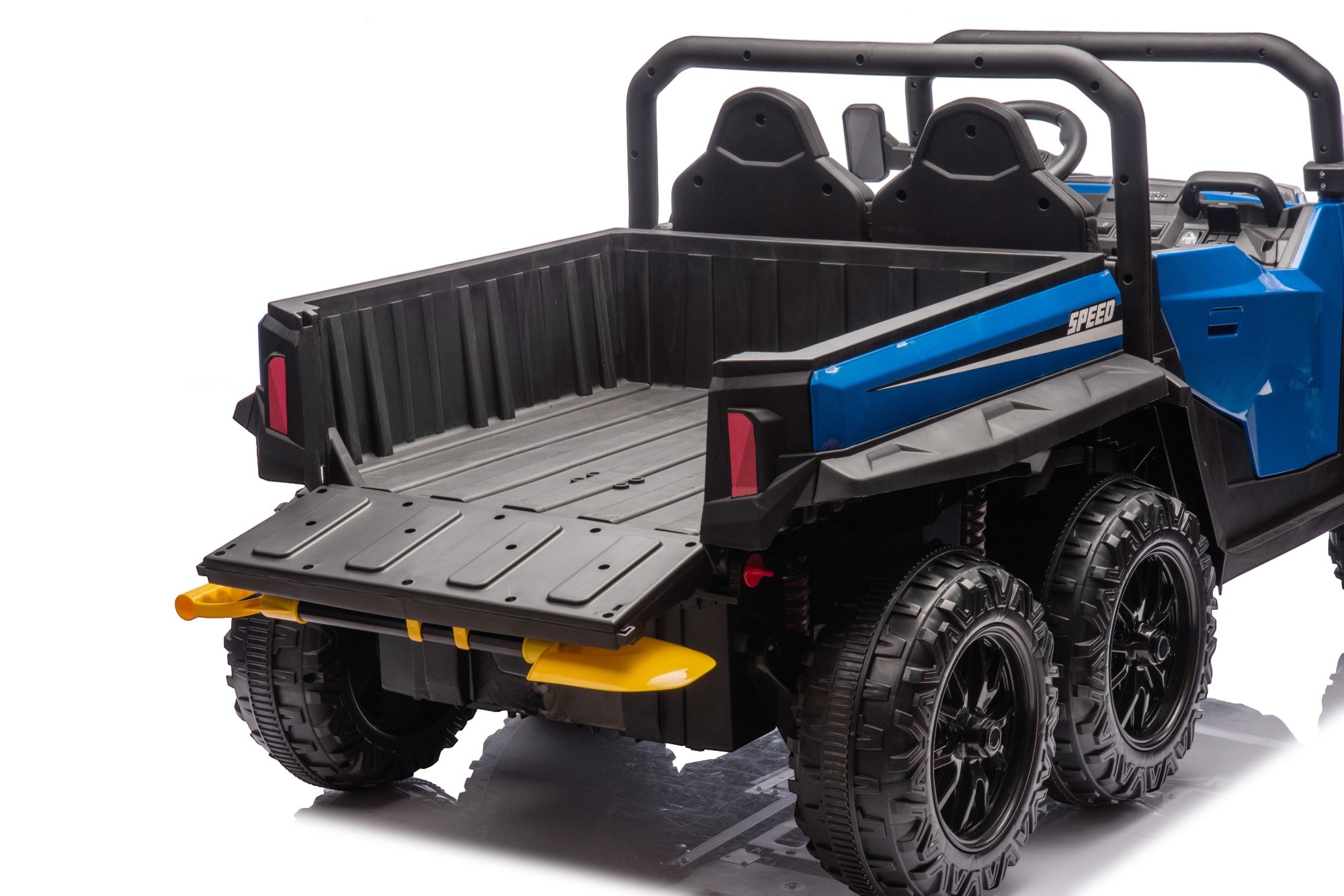 Rear view of blue 24V 6-wheel ride-on electric dump truck with open electric tipping bed and black leather seats