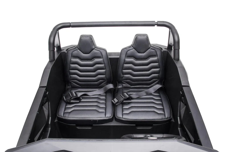 Two-seater black leather seats with seatbelts in a Stinger Buggy XL 24V 4x4 kids ride-on car interior.