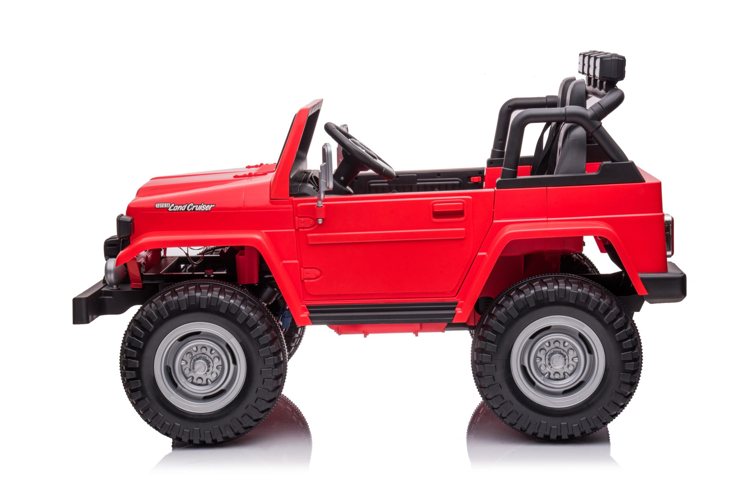 Red 24V 4WD Toyota FJ-40 kids electric ride-on car with two seats and rugged off-road tires.