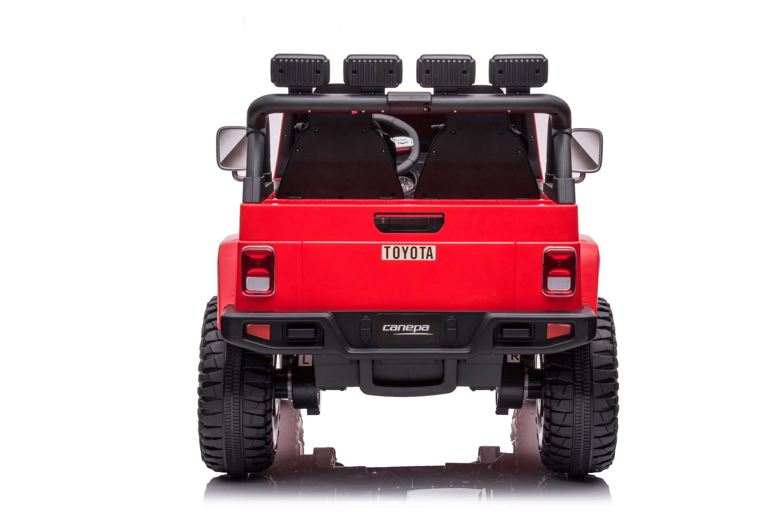 Rear view of a red 24V 4WD licensed Toyota FJ-40 kids ride-on electric toy car with two seats and rugged tires.