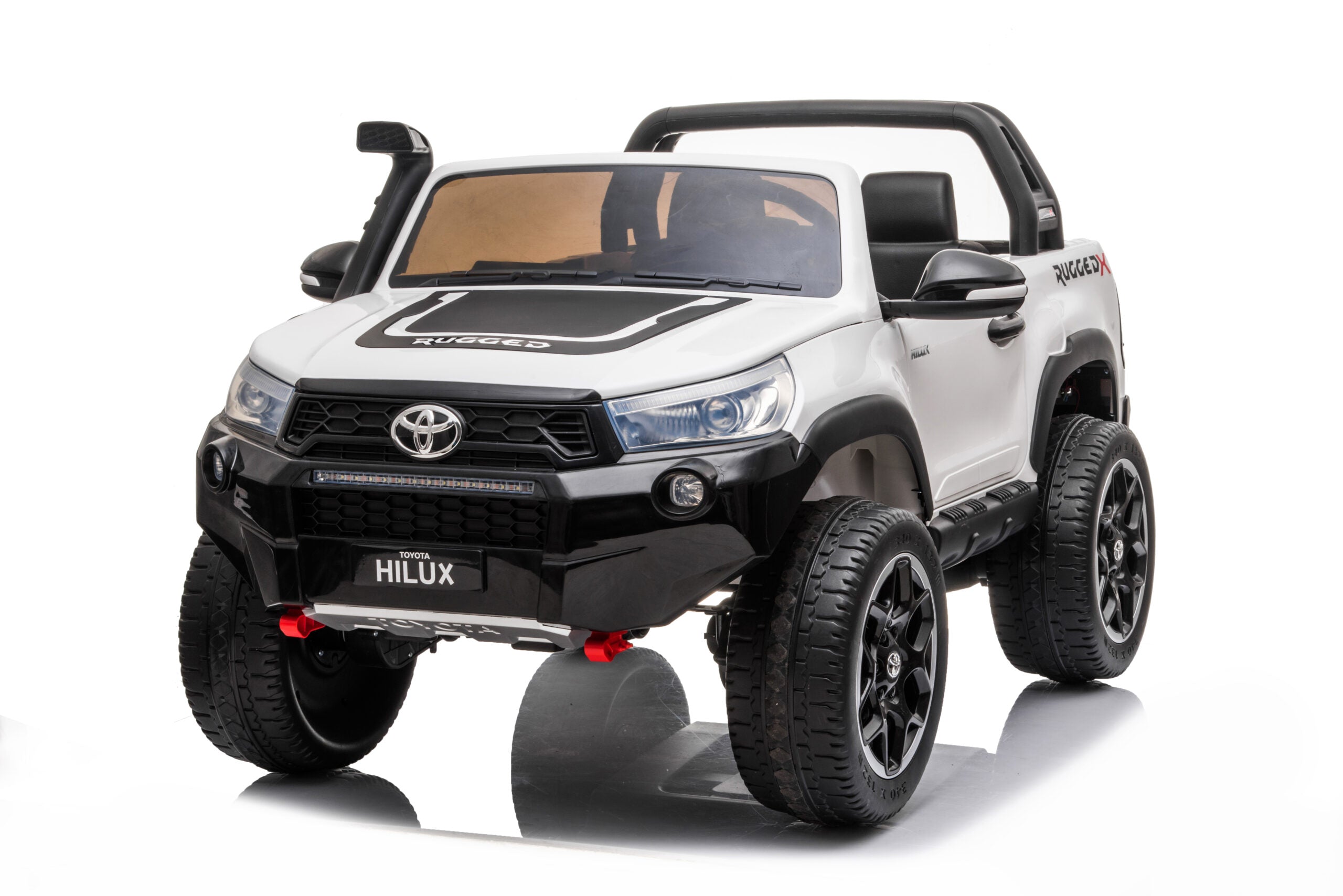 White 24V Ride-On Toyota Hilux 4WD electric car for kids with realistic details and rugged design.
