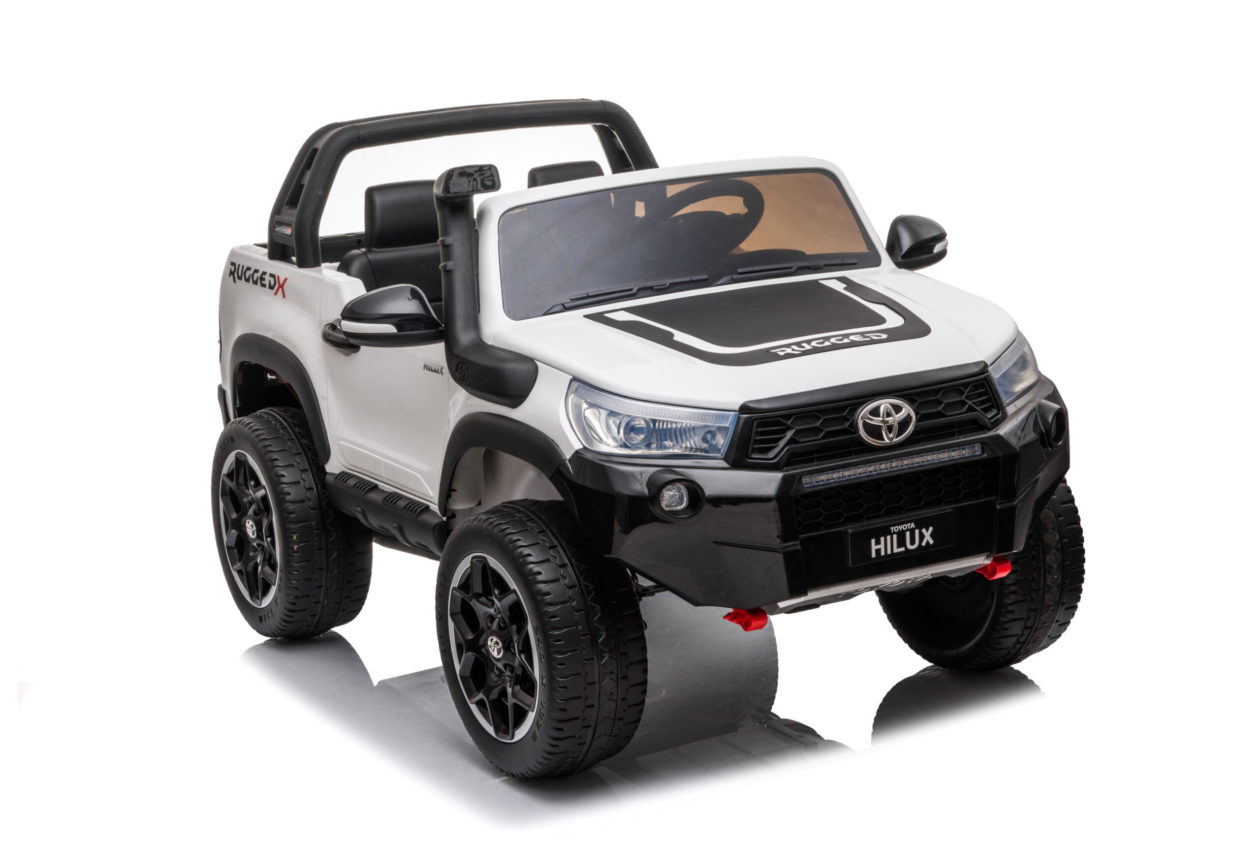 White 24V ride-on Toyota Hilux 4WD electric toy car with realistic details and rugged design for kids.