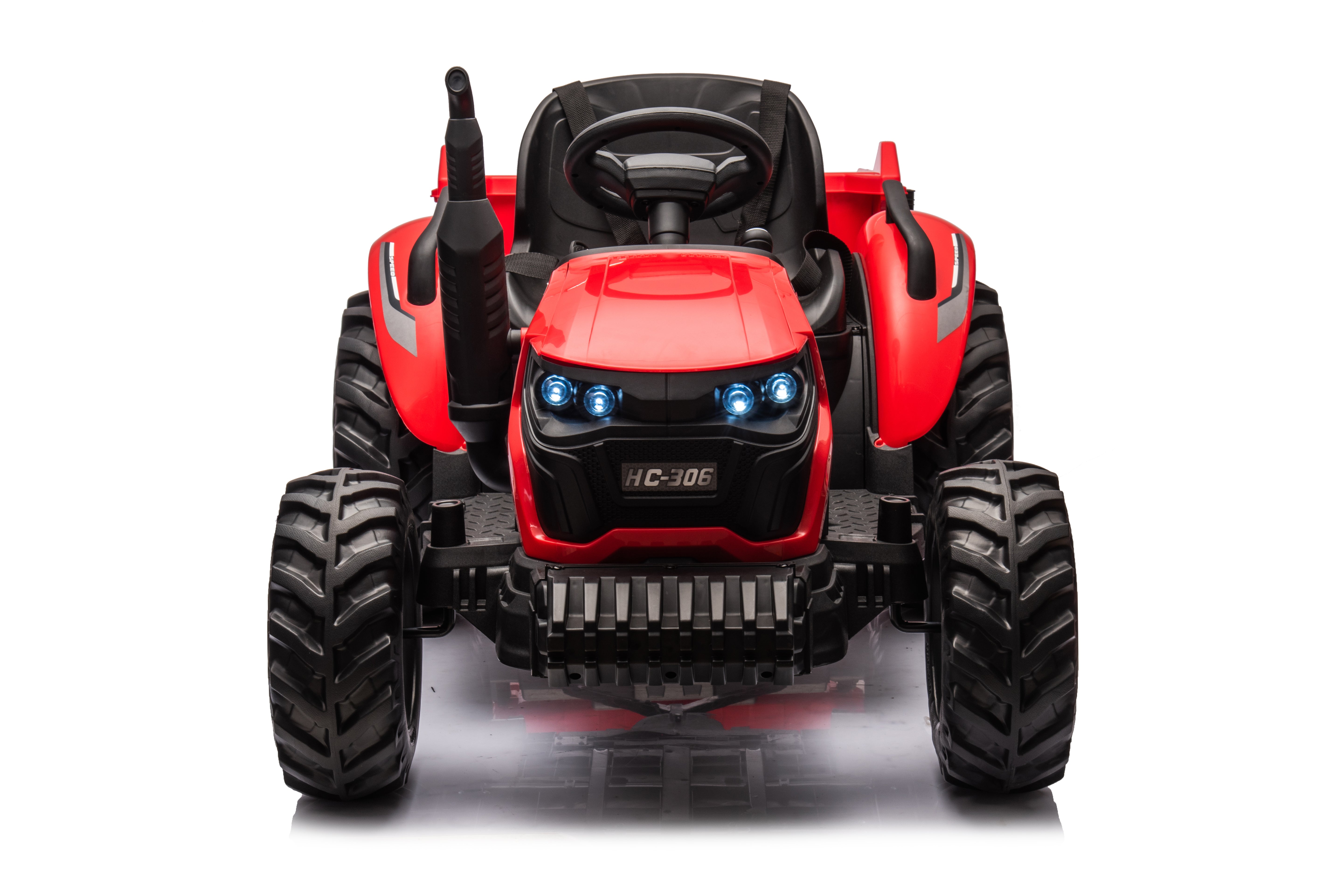 Red 24V kids ride-on farm tractor with dual motors, LED headlights, and realistic design, front view isolated on white.