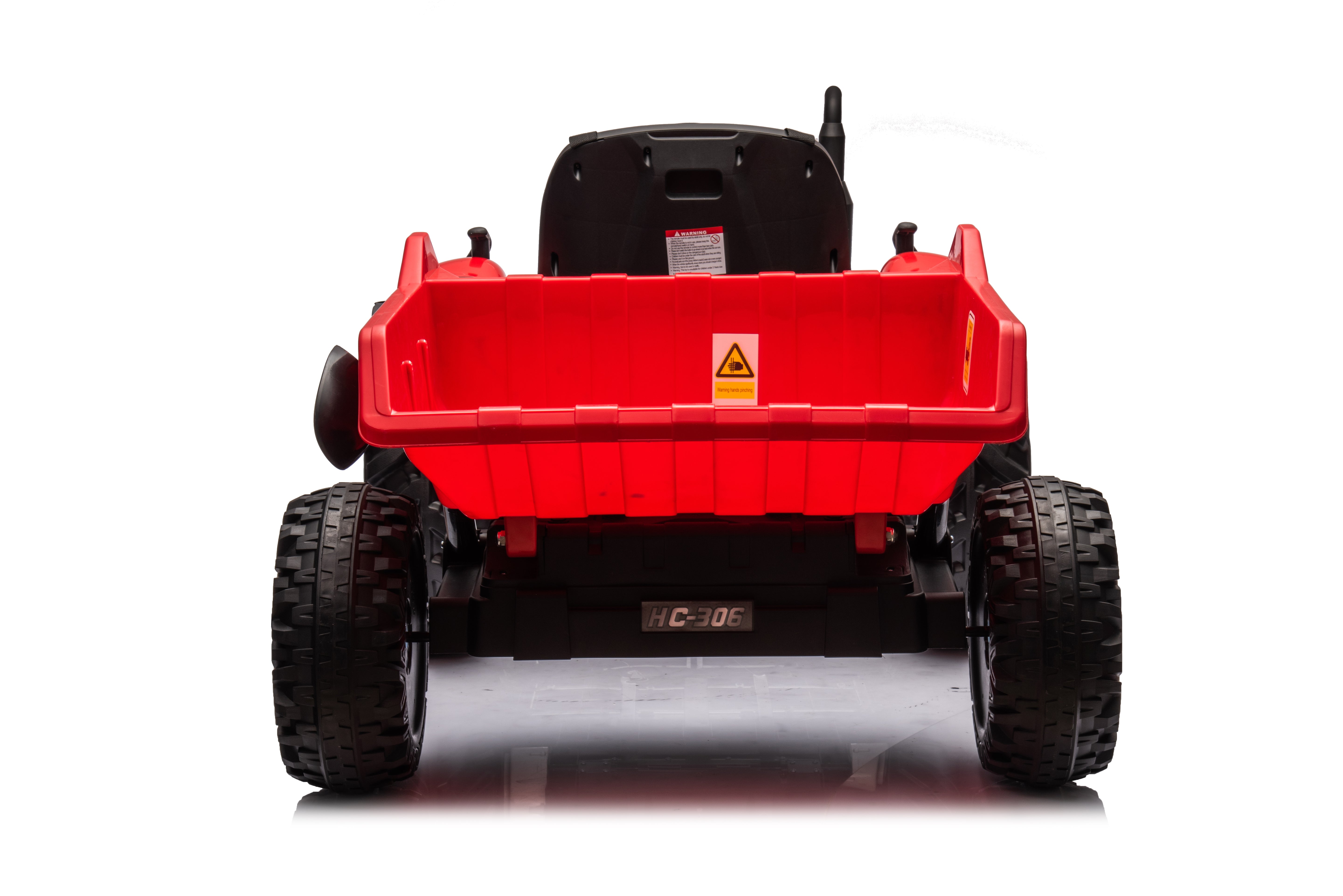 Rear view of a red 24V kids ride-on farm tractor with detachable trailer and large rugged wheels.