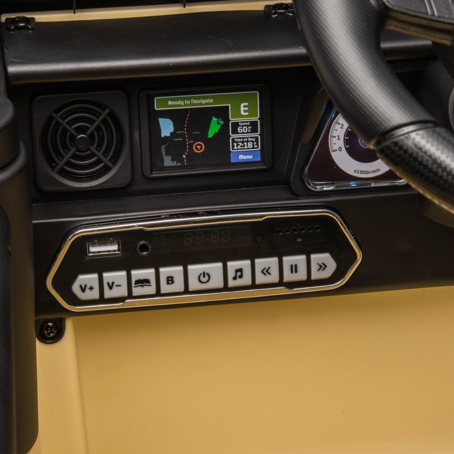 Close-up of the multifunctional central console with navigation screen and control buttons in a Toyota FJ Cruiser electric toy car.