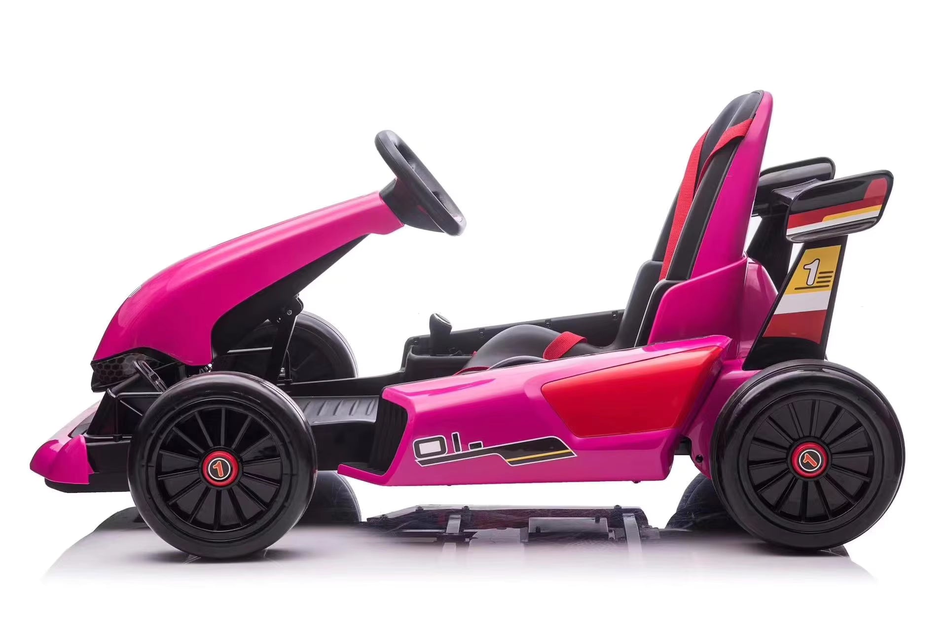 Pink 24V electric kids go-kart with drift function, black wheels, racing seat, and sporty aerodynamic design