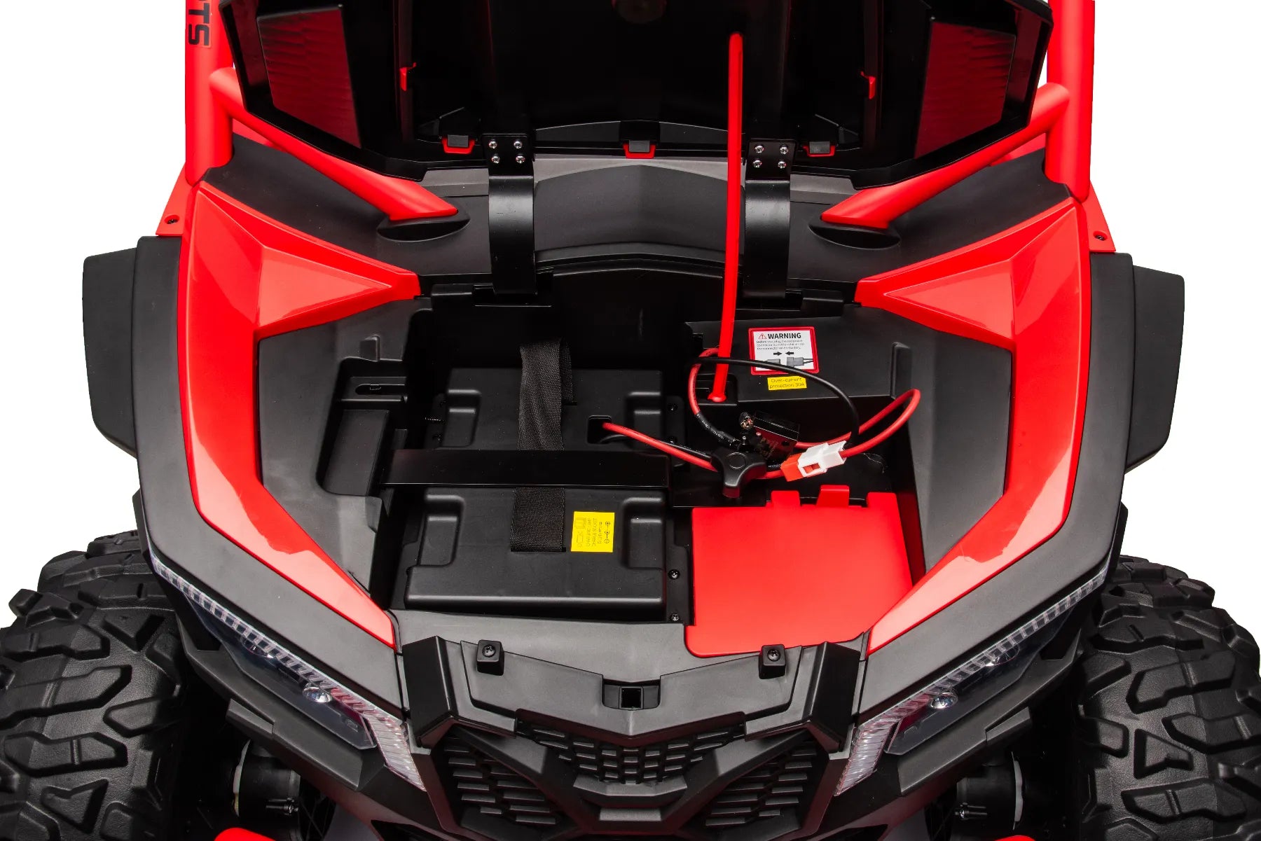 Open front compartment of red King of UTVs ZForce RZR Turbo 24V kids 2-seater electric ride-on buggy showing battery and wiring