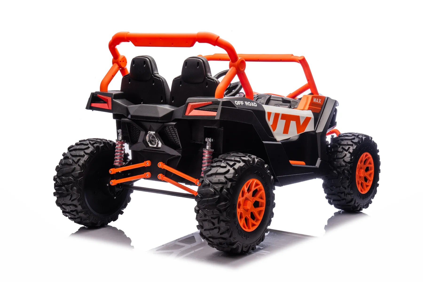 Rear view of orange and black 24V 1400W 2-seater King of UTVs ZForce RZR Turbo ride-on buggy with rugged tires