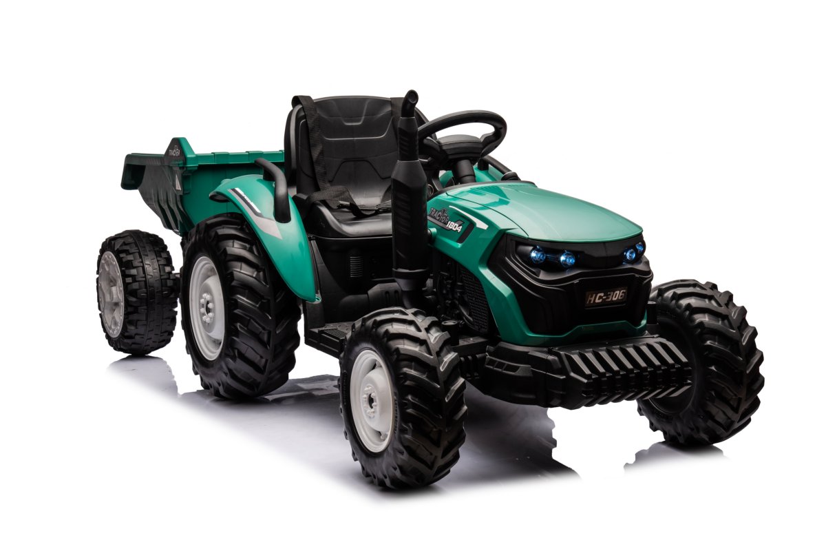 Teal green 24V kids ride-on farm tractor with dual motors, parental remote, and detachable trailer on white background.
