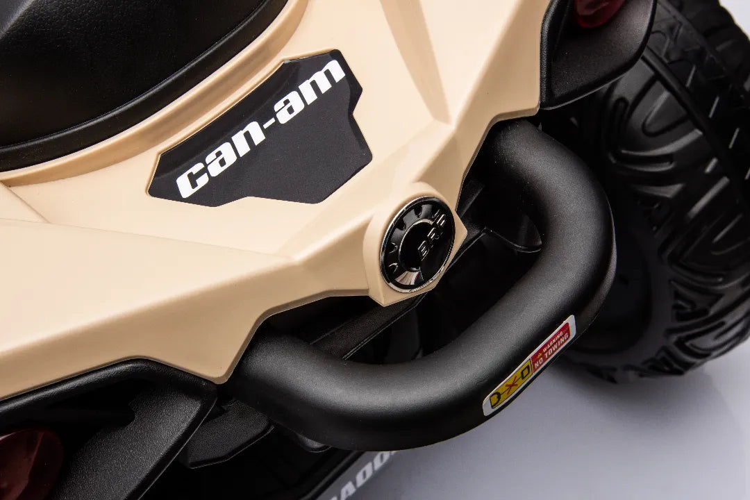 Close-up of khaki Can-Am Renegade 4x4 ATV ride-on bike with black handlebar and branded logo detail