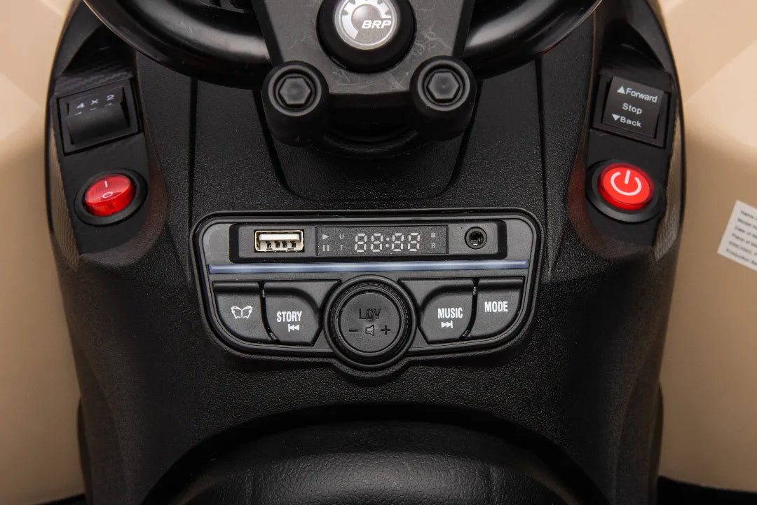 Control panel with USB port, volume control, story and music buttons on 24V Can-Am Renegade 4x4 ATV quad bike