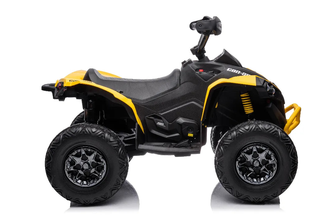 Side view of yellow 24V Can-Am Renegade ride-on ATV quad bike with four large rugged tires and black seat