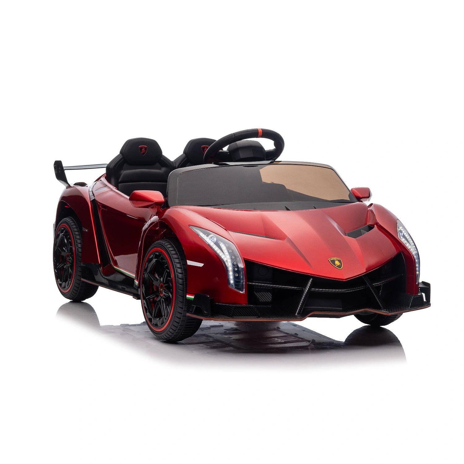 Red licensed Lamborghini Veneno 12V ride-on car for kids with dual seats, sporty design, and black rims.