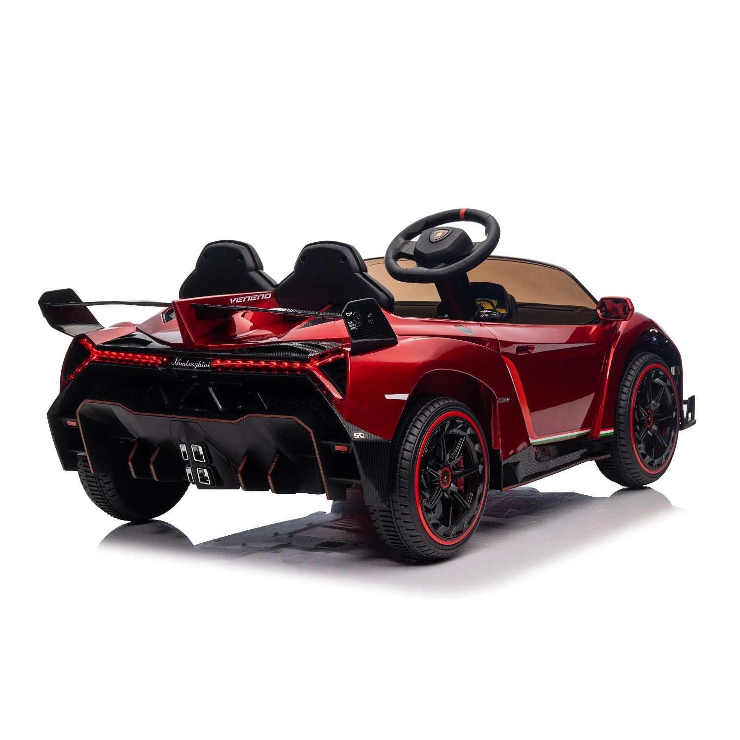 Rear view of red licensed Lamborghini Veneno kids ride-on car with black seats and detailed taillights and spoiler