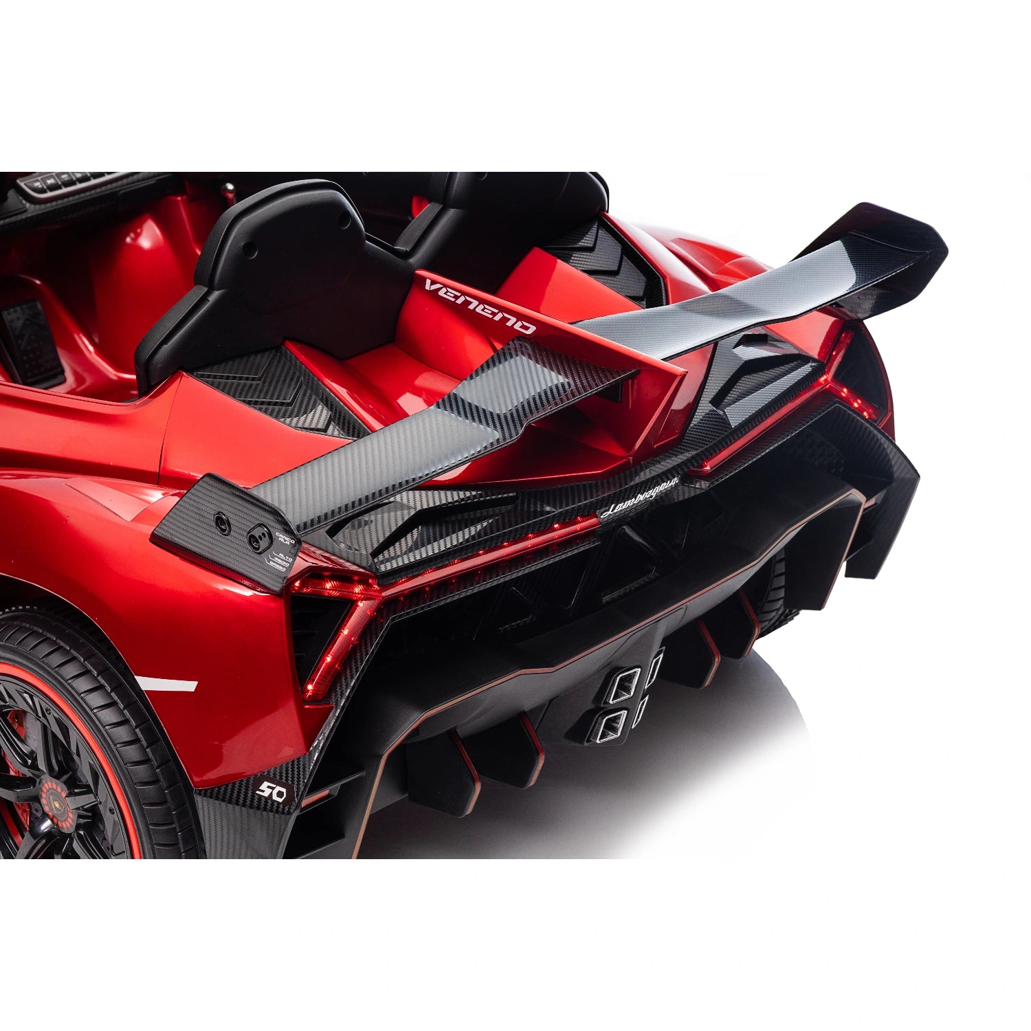 Close-up of rear wing and exhaust details on red licensed Lamborghini Veneno 12V ride-on car for kids