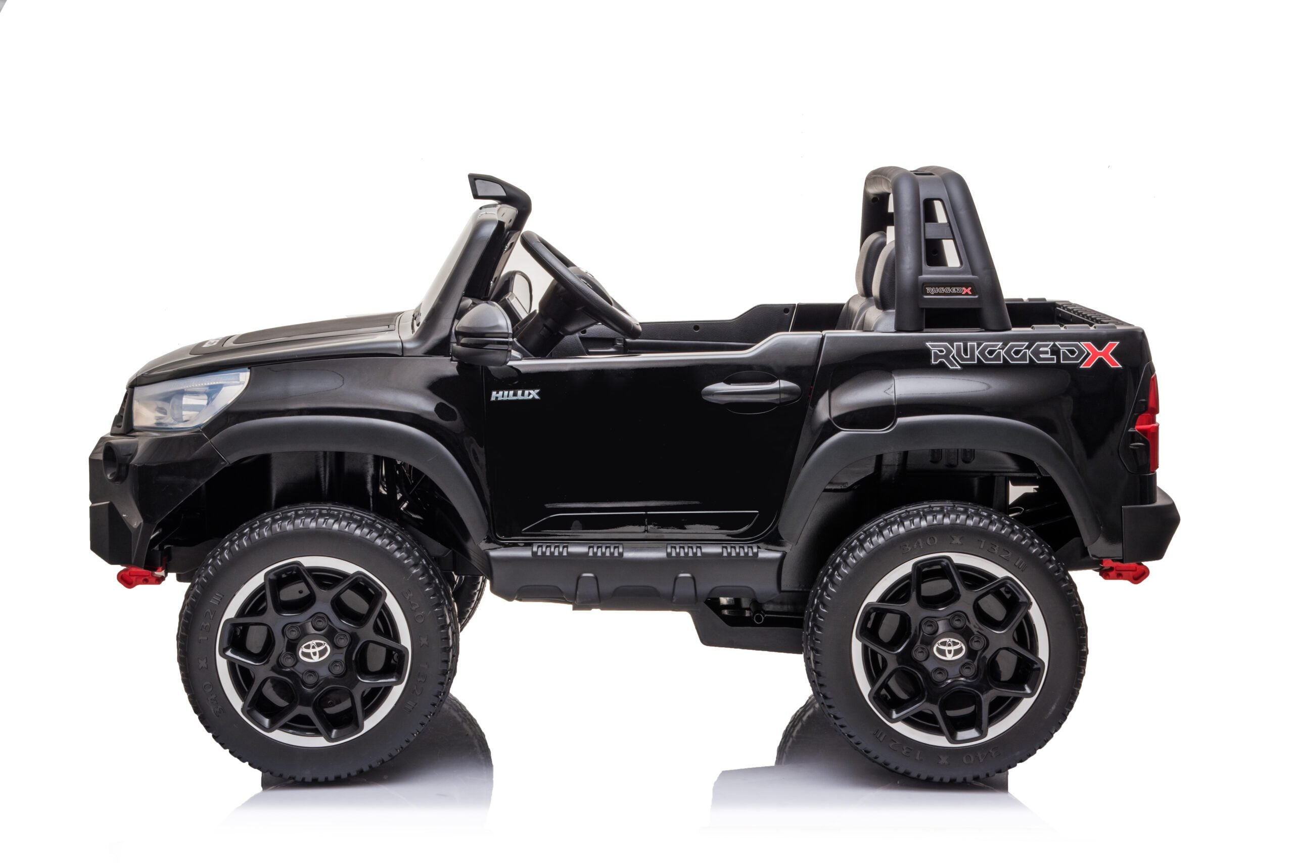 Black 24V Toyota Hilux 4WD ride-on electric car for kids with leather seats, LED lights, and remote control