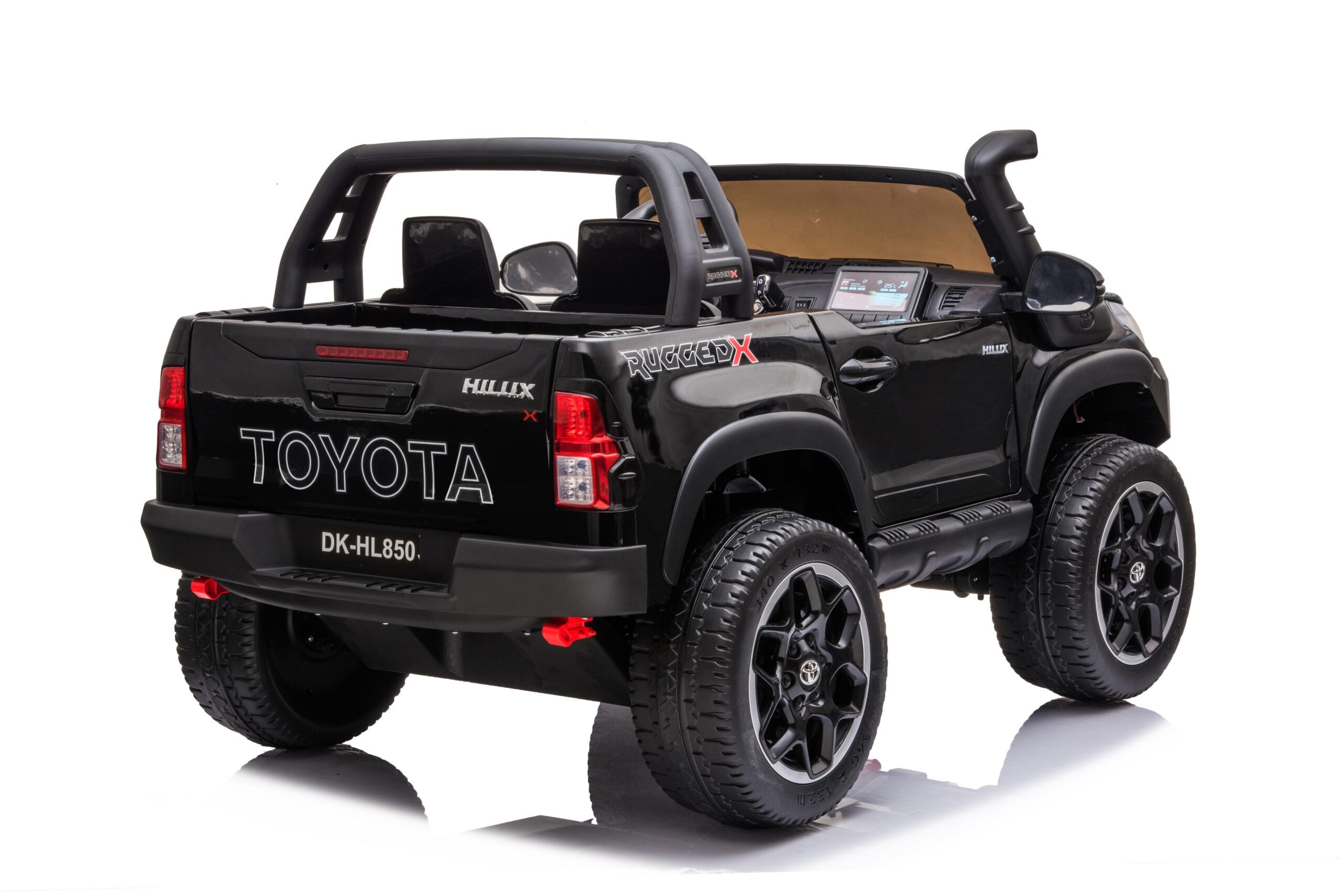 Black 24V Toyota Hilux 4WD ride-on electric car for kids with realistic details and remote control.