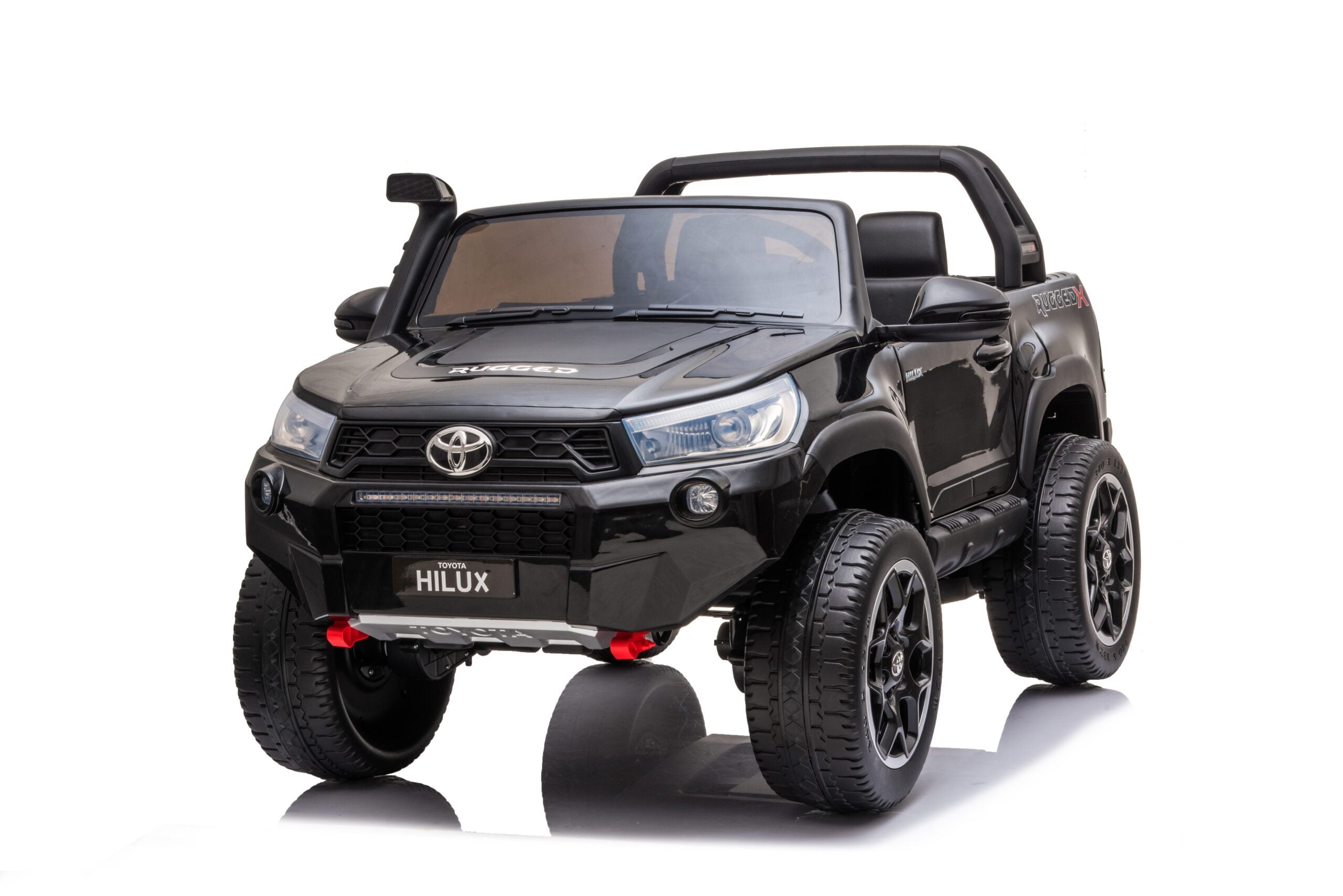 Black 24V ride-on Toyota Hilux 4WD electric car for kids with realistic details and large tires