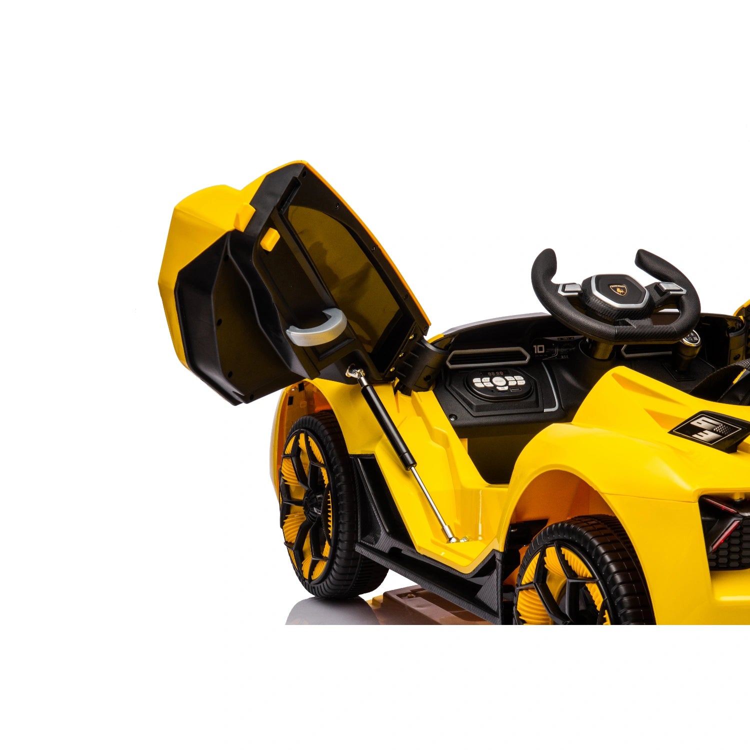 Close-up of yellow 12V Lamborghini inspired kids ride-on car with open scissor door and black interior details.