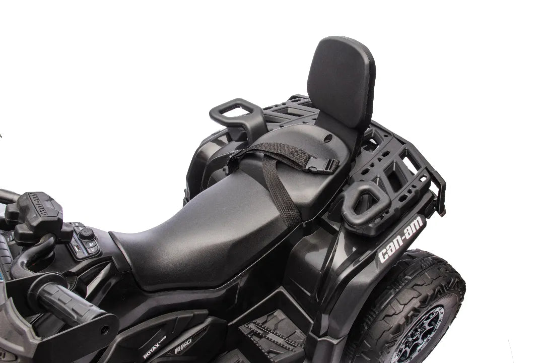 Close-up of black 24V 800W licensed Can-Am Outlander 2-seater quad bike seat and rear cargo rack with safety belt.