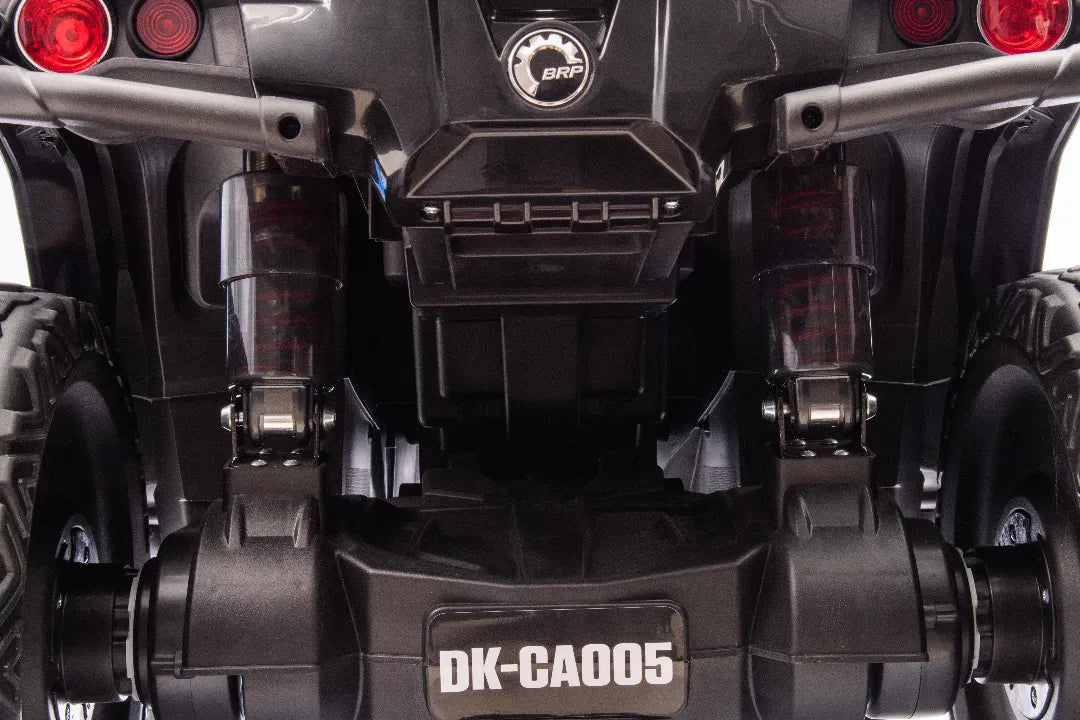 Close-up of rear suspension and axle of black 24V 800W Can-Am Outlander 2-seater 4x4 ATV quad bike for kids
