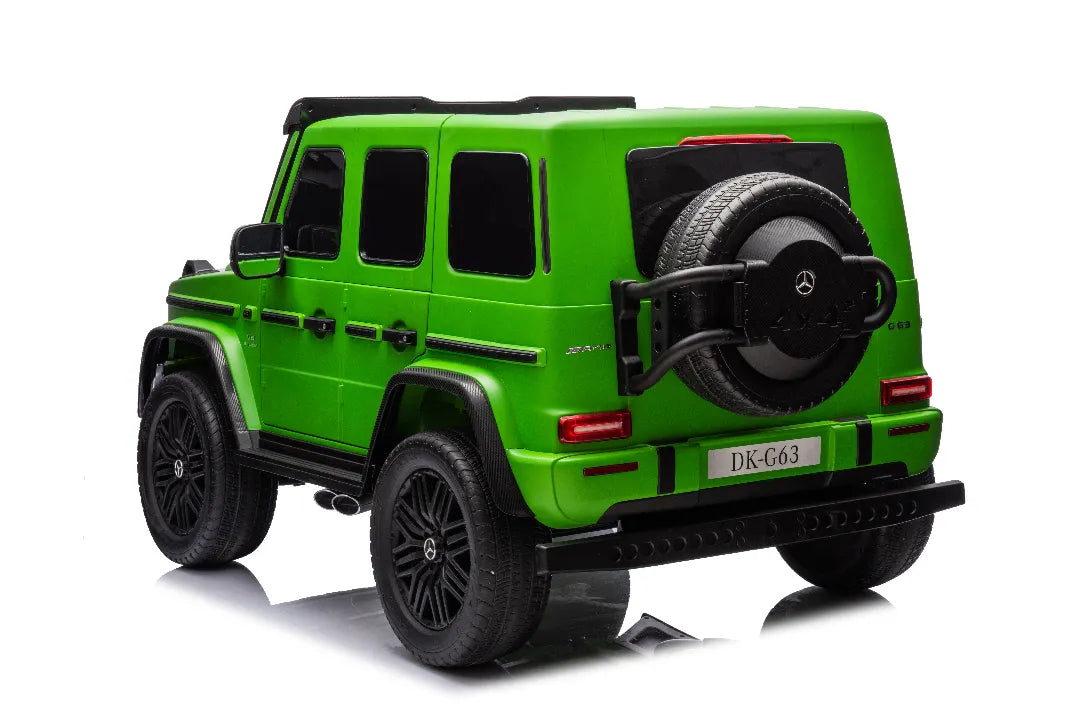 Rear view of green licensed 24V 14Ah Mercedes-AMG G63 kids ride-on car with spare tire and black wheels
