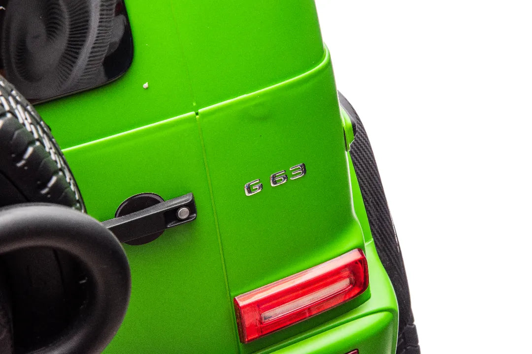 Close-up of green 24V licensed Mercedes AMG G63 kids ride-on car rear with G63 badge and red tail light details