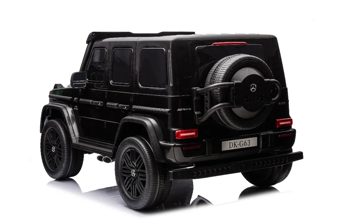 Rear view of black 24V 14Ah licensed Mercedes-AMG G63 800W 4x4 kids ride-on car with spare tire and detailed taillights