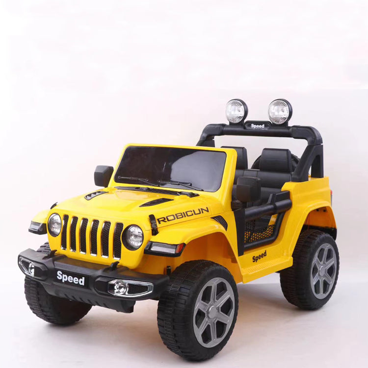 Yellow 12V Jeep Wrangler inspired 4WD kid ride-on car with black seats, off-road tires, and front spotlights.