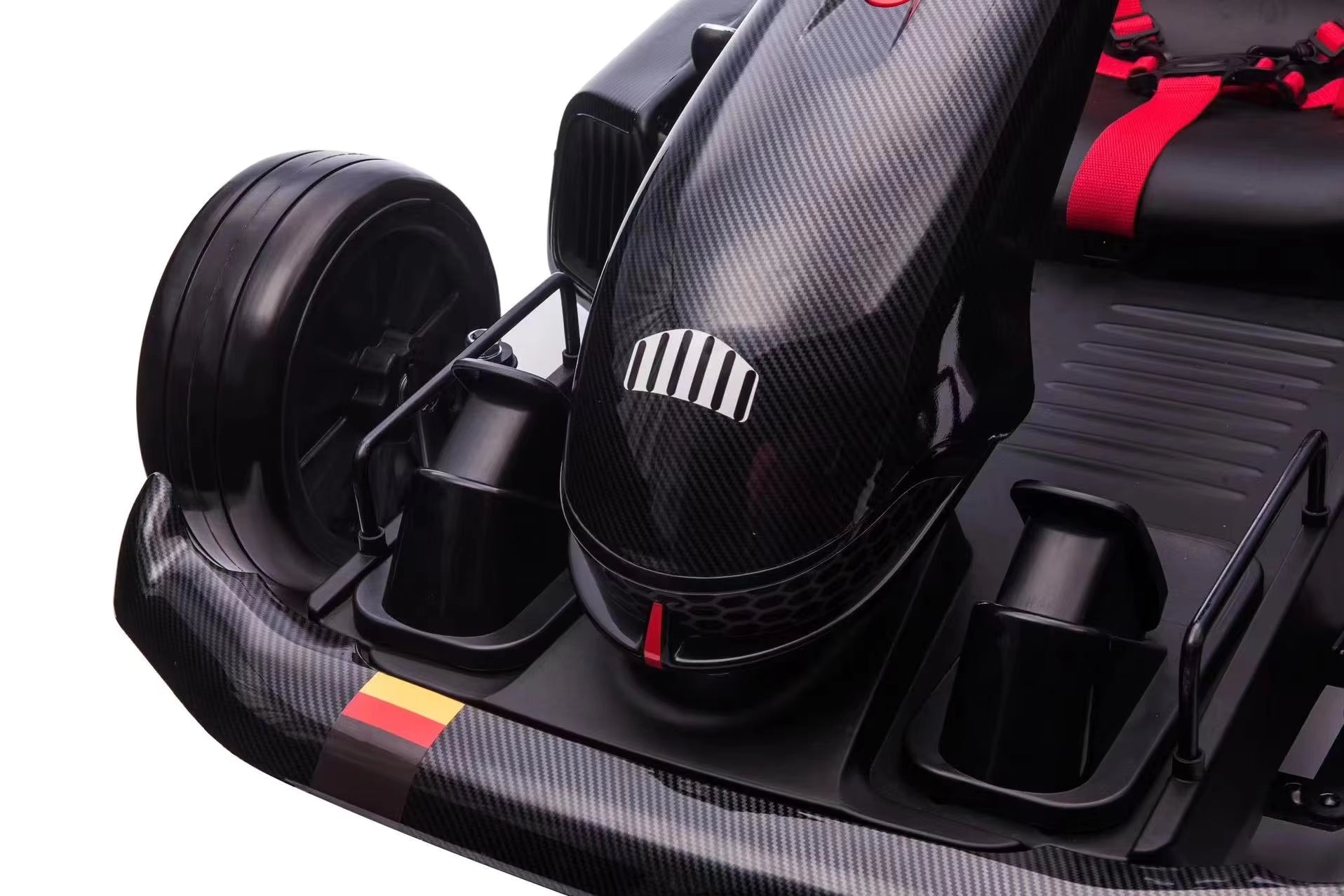 Close-up of black and red 24V electric go-kart front with carbon fiber texture and padded racing seat visible