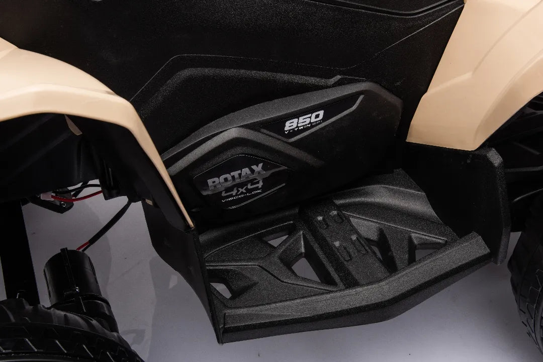 Close-up of footrest and Rotax 850 engine detail on khaki 24V licensed Can-Am Renegade 4x4 ATV quad bike for kids