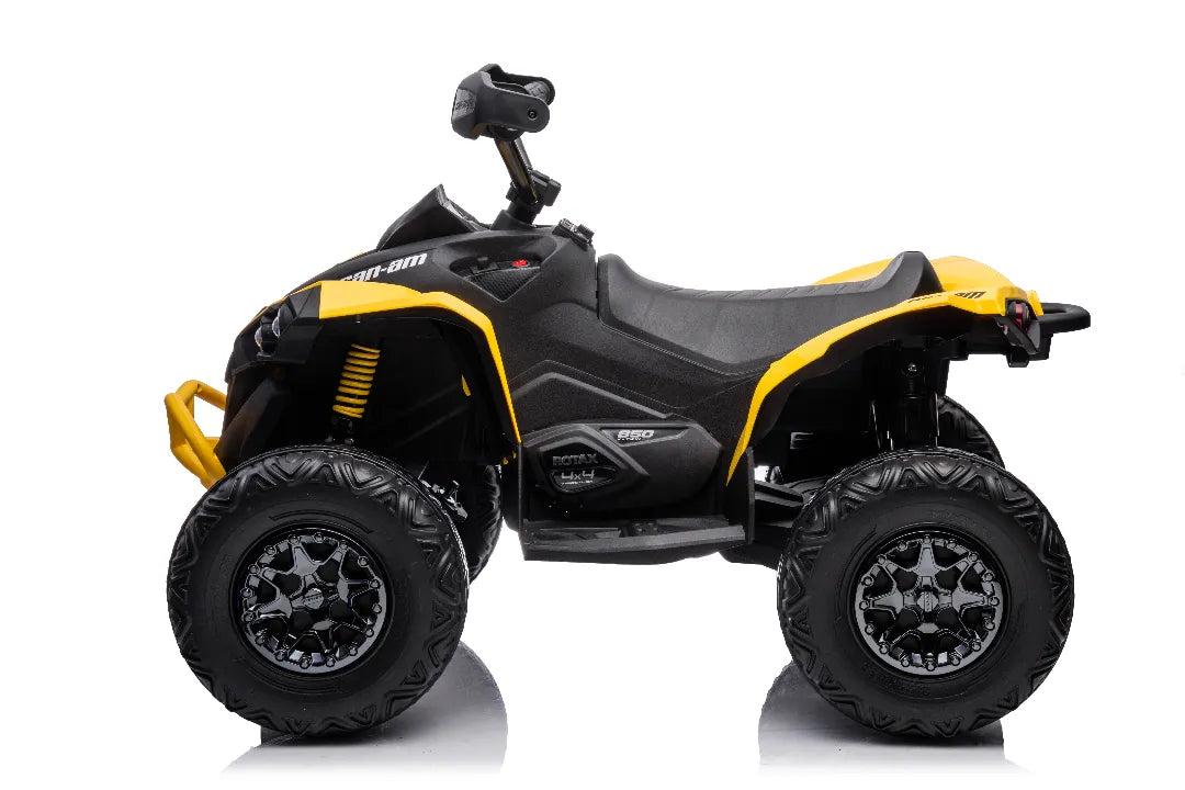 Side view of yellow 24V Can-Am Renegade ride-on ATV quad bike with rugged black tires and detailed body design
