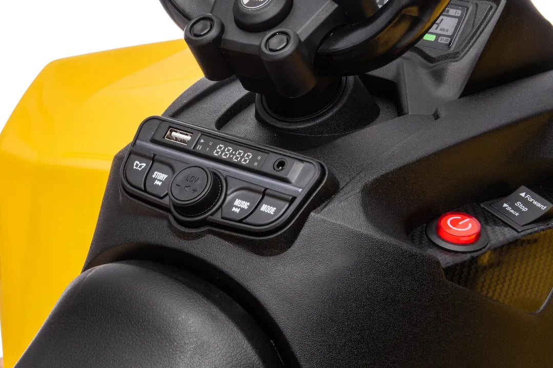 Close-up of black control panel with buttons and USB port on yellow 24V Can-Am Renegade ride-on ATV quad bike