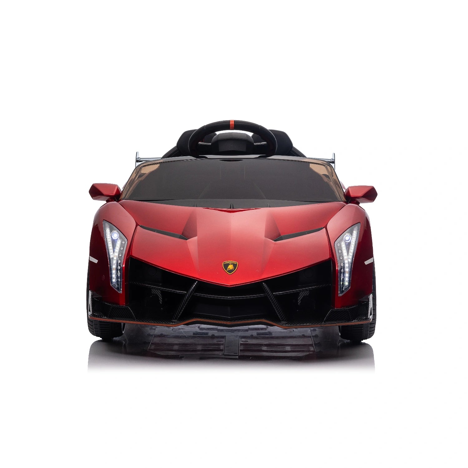 Front view of red licensed Lamborghini Veneno 12V ride-on car for kids with detailed headlights and steering wheel visible